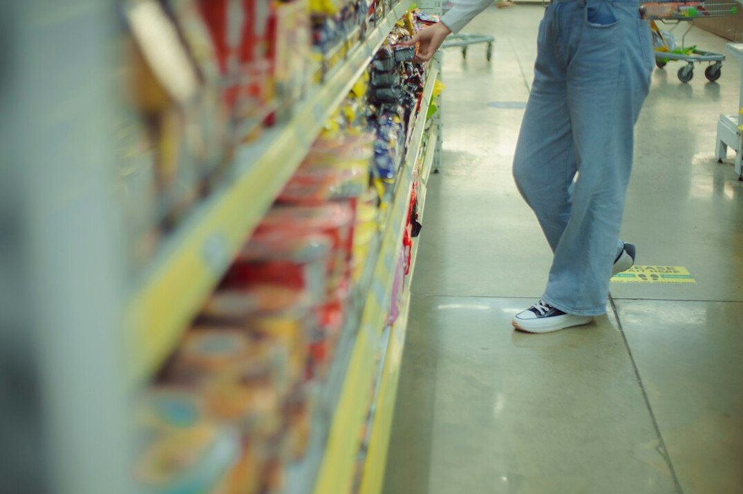 store detective observing shoppers