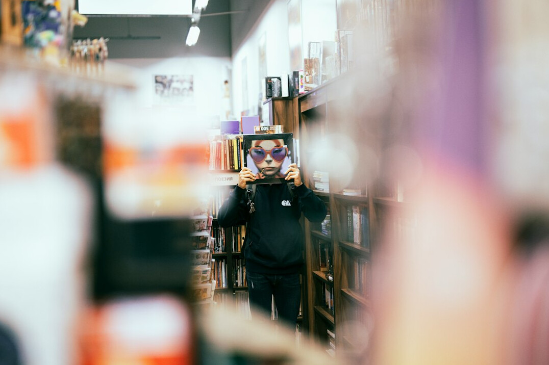 store detective watching customers